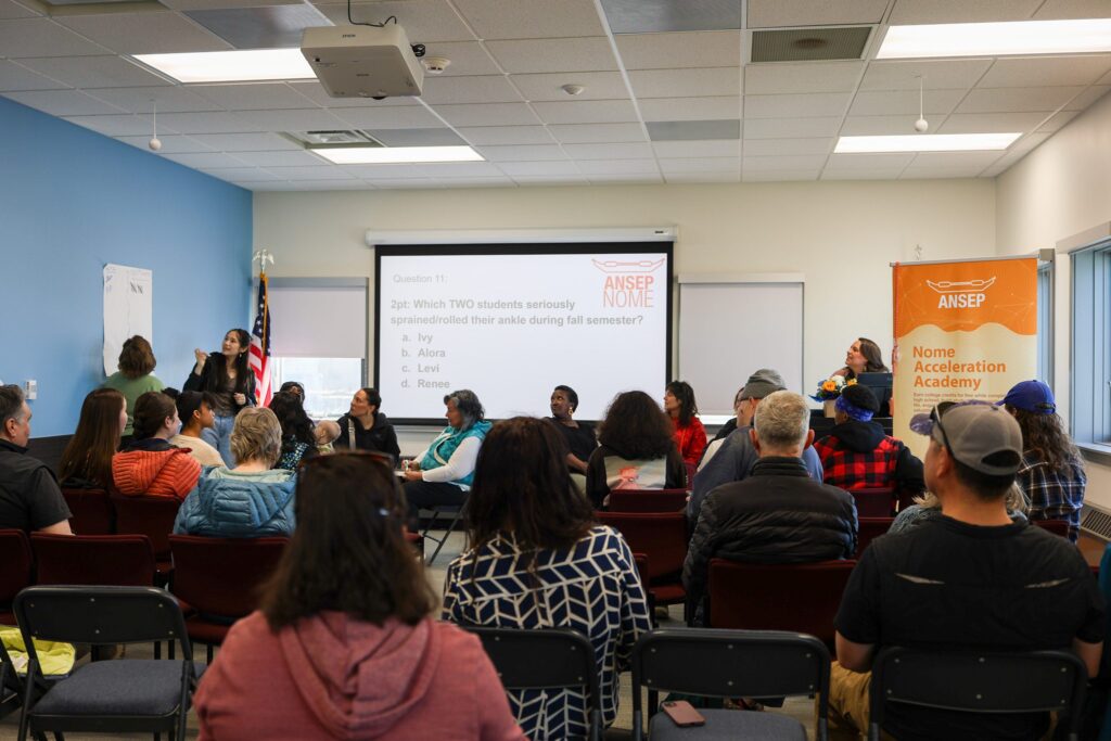 Family and friends play trivia at the end of the year celebration for the ANSEP Acceleration Academies inaugural class. Quinn White/KNOM
